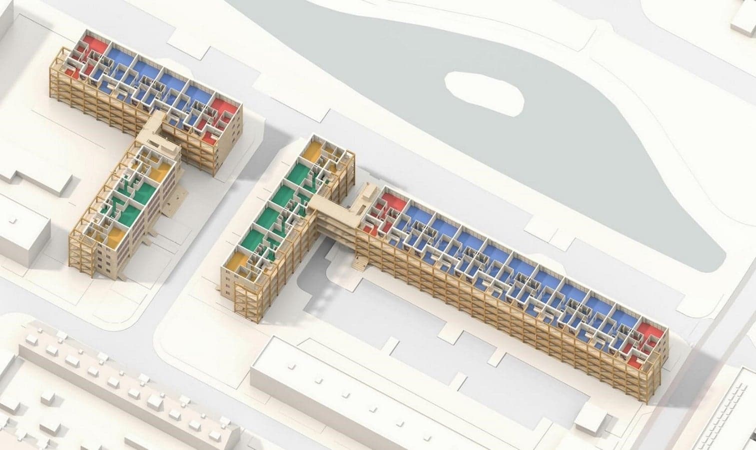Aerial axonometric view of modular housing units showing individual modules stacked into buildings